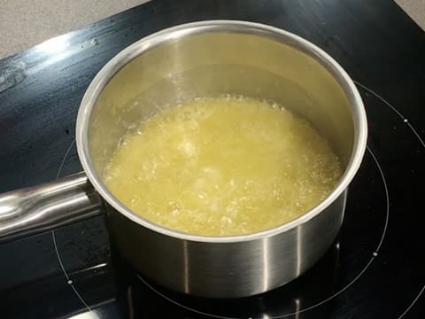 The butter starts boiling in the saucepan