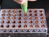 Cannelé Chocolates with a Praline Filling - 7