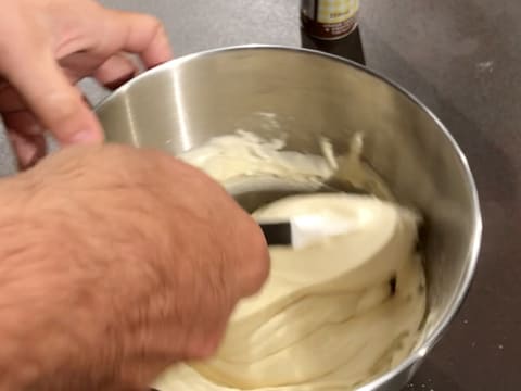 Combine the ingredients in the bowl with the spatula