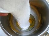 Pour the castor sugar over the whole eggs in the stand mixer bowl