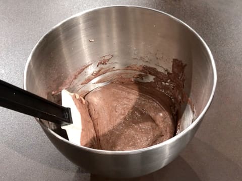 The chocolate sponge cake is ready in the bowl