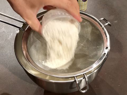 Place the flour into a sifter over the stand mixer bowl