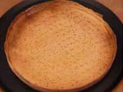 Coating a blind baked pie shell