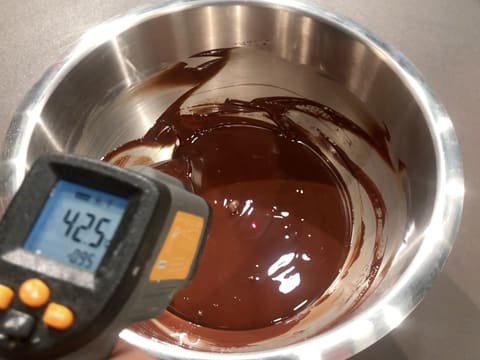 The temperature of the melted dark chocolate shows 42.5°C
