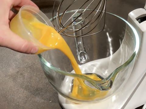 Pour the beaten egg in the stand mixer bowl fitted with the whisk