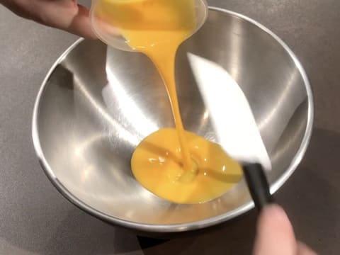 Place the egg yolks in a mixing bowl