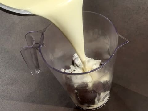 Pour the cream into the jug over the dark chocolate