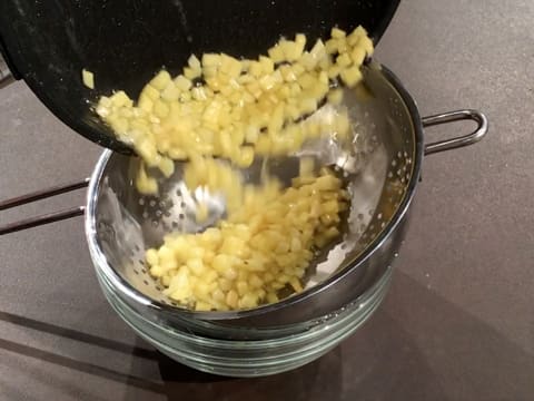 Pour the fruit cubes through a sieve over a bowl