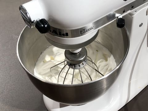 Whipped cream in the stand mixer bowl