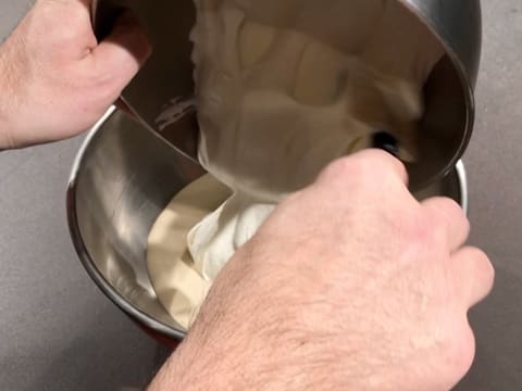 Add whipped cream to the preparation inside the bowl