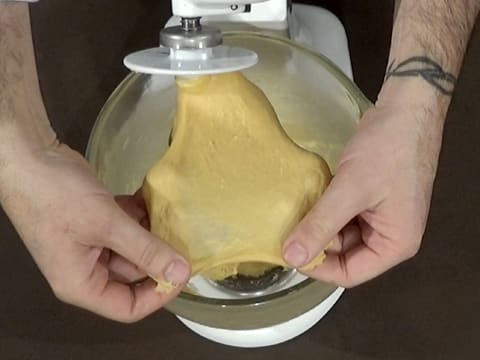 Stretch the translucent dough with your hands
