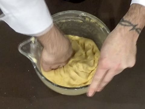 Knock the dough back with your hand
