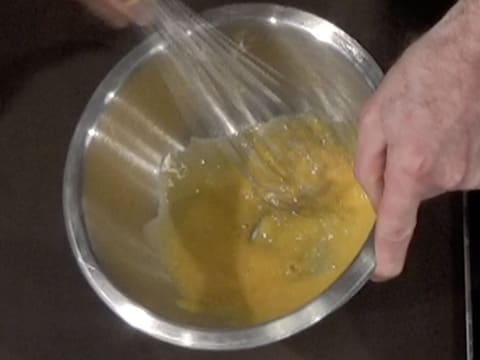 Whisk the egg yolks and castor sugar together