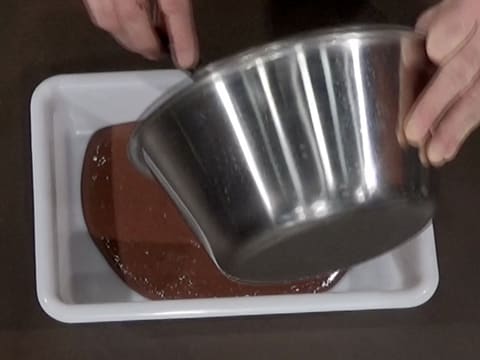 Transfer the chocolate crémeux into a tray