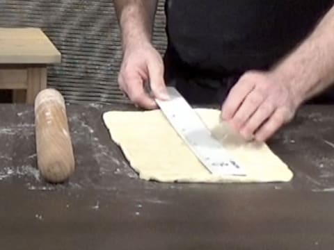 Measure the dough rectangle with a graduated ruler