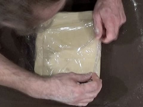 The dough is wrapped with cling film