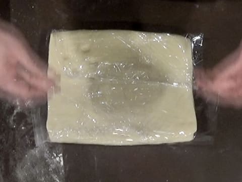 The dough is wrapped with cling film