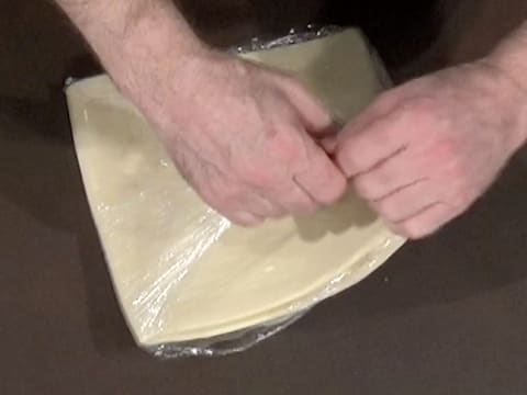 Remove the dough from the cling film