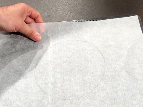 Flip the baking parchment on a perforated baking sheet