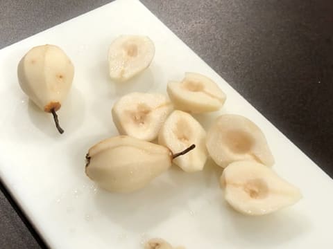 The pears are pitted and cut in half