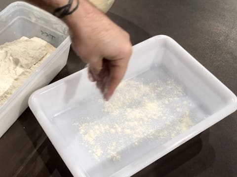 Flour a food tray