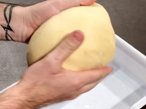 Shape the brioche dough into a ball