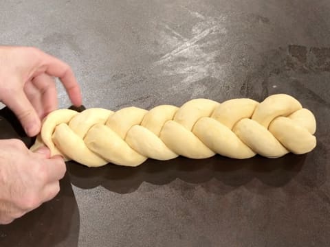 The plaited brioche is on the kitchen worktop