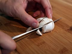 Slicing a mushroom