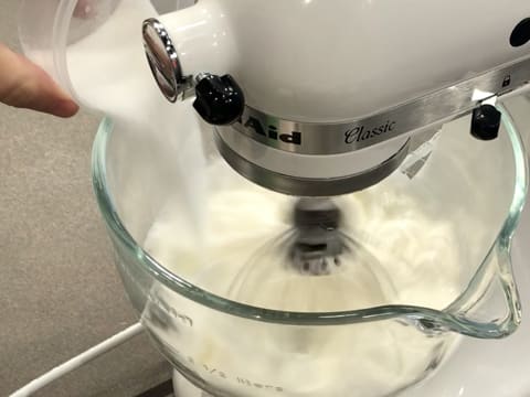 Pour the rest of the castor sugar in the stand mixer bowl