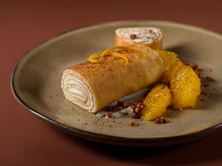 Crêpes roulées à la vanille et agrumes confits
