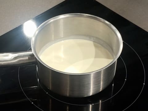 The whipping cream is in a saucepan