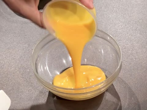 Place the egg yolks in a bowl