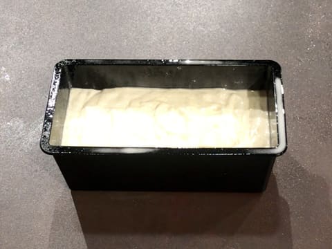 The sponge cake preparation is in the bread pan