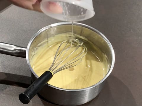 Add the hydrated gelatine to the cream in the saucepan