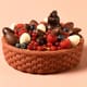Easter Basket with Chocolate Eggs & Red Berries