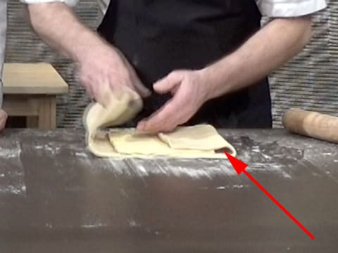 Fold the opposite side of the dough over the butter