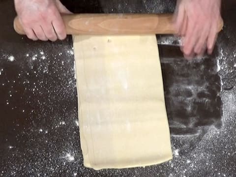 Roll out the dough lengthwise with a rolling pin