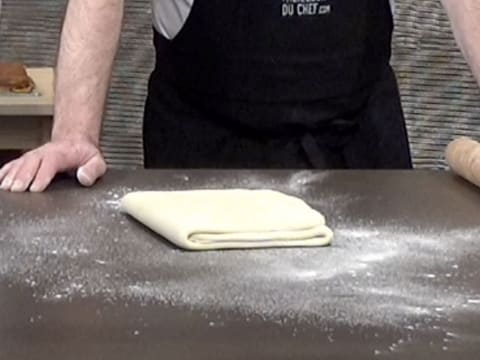 Place the dough on the floured kitchen workbench