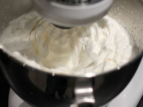 Beat the whipping cream in the whisk in the stand mixer until you get a whipped cream