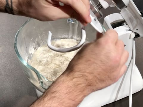 Attach the dough hook to the mixer