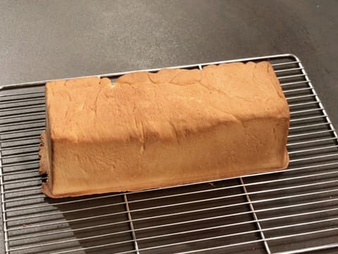 The golden bread loaf is the cooling rack